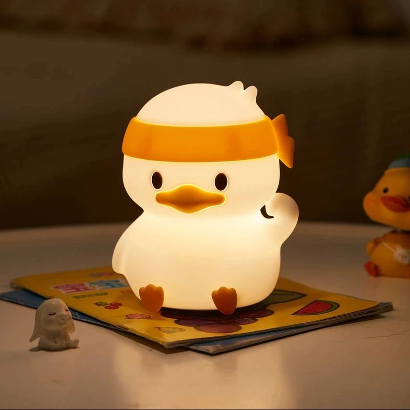 چراغ خواب شارژی سیلیکونی طرح اردک هدبند دار